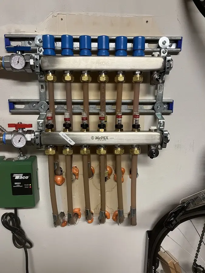 Plumber performing Water Heater Repair at a residential property in San Diego